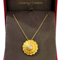 a view of the pendant displayed in its carrera y carrera box