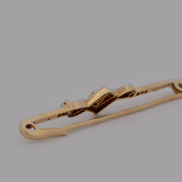 rear of the pin with closure showing