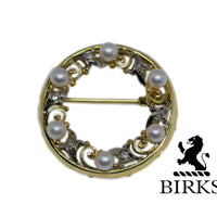 birks logo with the brooch