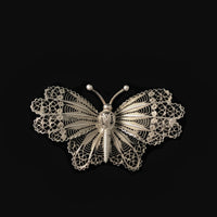 front of the brooch showing the filigree work