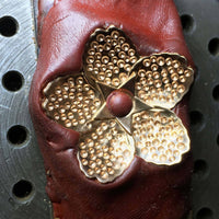 the petals are drilled before the diamonds are hand-set (pavé)