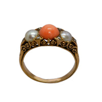 view of the coral, pearls, diamonds, and carvings on the ring