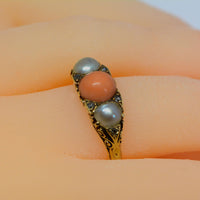 side angle view of the ring on a finger