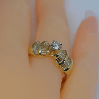 showing the ring on a finger