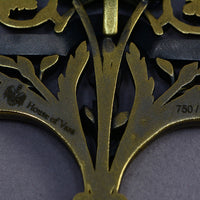 showing the logo and metal stamp