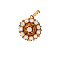 viewing the pearls and cannetille work on the pendant from the front