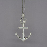 the silver version of the anchor with six diamonds