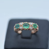 showing the emeralds under bright LED lights