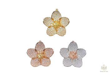 The cherry blossom pendants in different gold colours