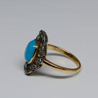 side view of the ring showing the gold shank with silver top