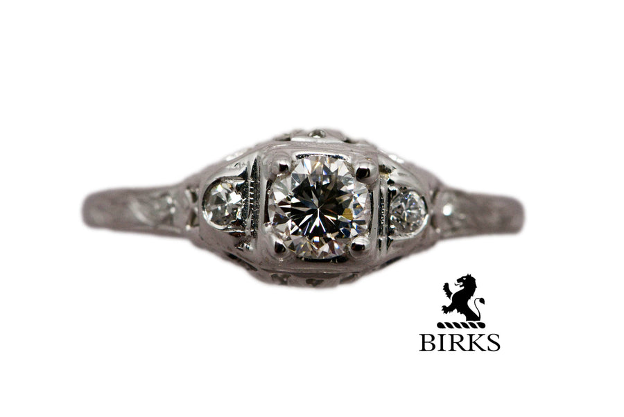 view of the ring's center diamond and birks logo
