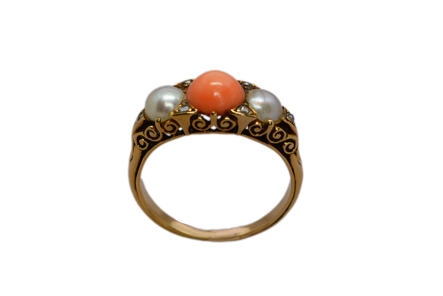 view of the coral, pearls, diamonds, and carvings on the ring