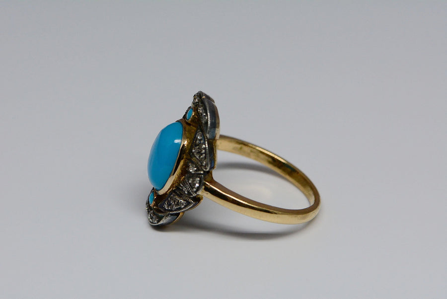 side view of the ring showing the gold shank with silver top